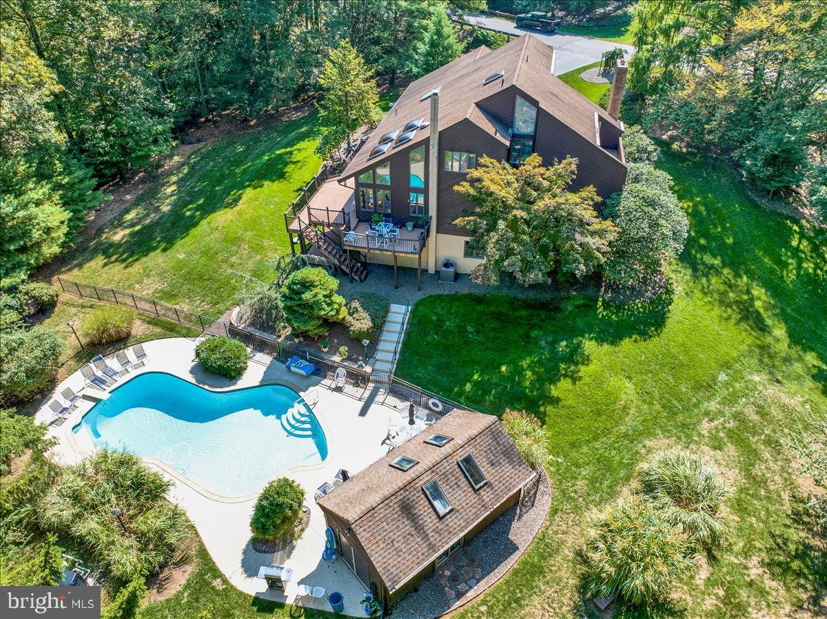 7 Hessian Boulevard Reading, PA 19607 - Photo 3 of 71 Serene retreat with pool and lush greenery.