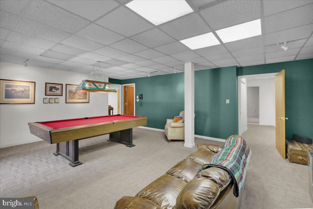 7 Hessian Boulevard Reading, PA 19607 - Photo 44 of 71 Spacious game room with vibrant green walls.