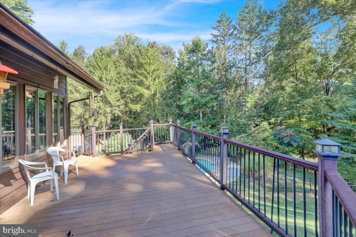 7 Hessian Boulevard Reading, PA 19607 - Photo 54 of 71 Serene deck overlooking lush greenery.