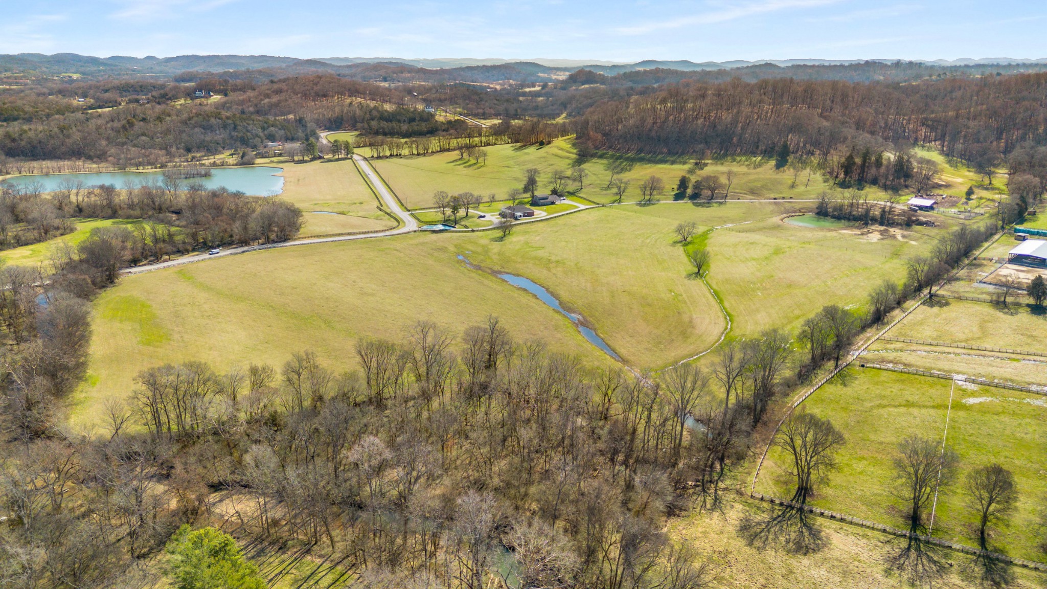 3317 Floyd Road Franklin, TN 37064 - Photo 1 of 38 a view of a lake with a mountain