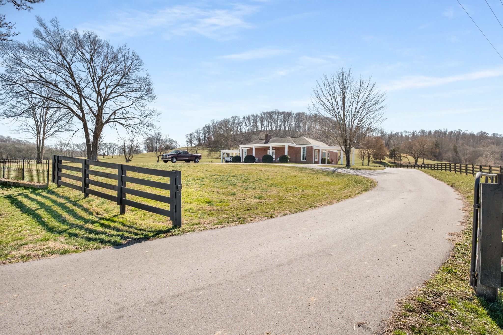 3317 Floyd Road Franklin, TN 37064 - Photo 24 of 38 a view of a lake with a house in the background