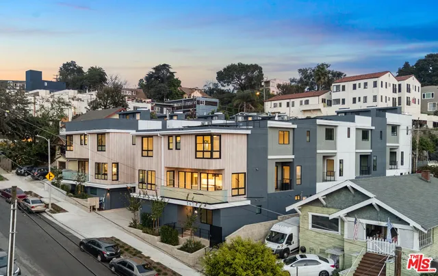 a front view of a building with street view
