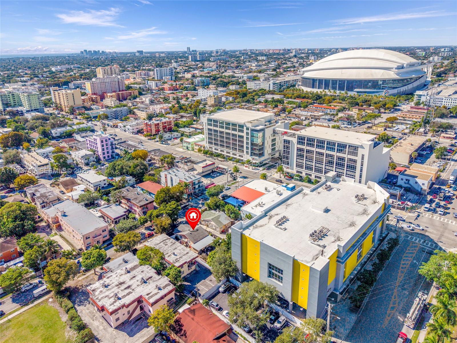 1143 Northwest 6 Street Miami, FL 33136 - Photo 15 of 18 an aerial view of a houses with a city view