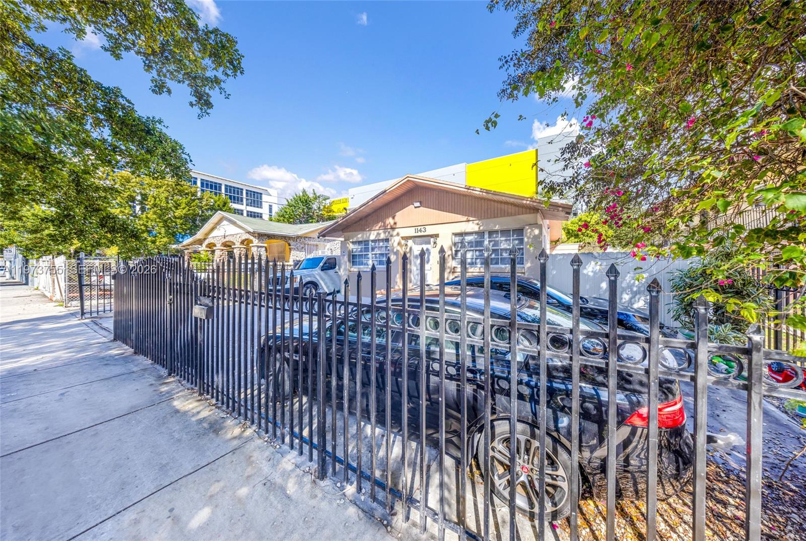 1143 Northwest 6 Street Miami, FL 33136 - Photo 4 of 18 a view of swimming pool in front of house