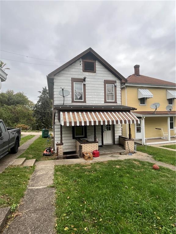 924 Locust Avenue Monessen, PA 15062 - Photo 22 of 25 a view of a house with a yard patio and sitting area
