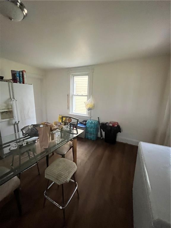 924 Locust Avenue Monessen, PA 15062 - Photo 8 of 25 a room with furniture and a window