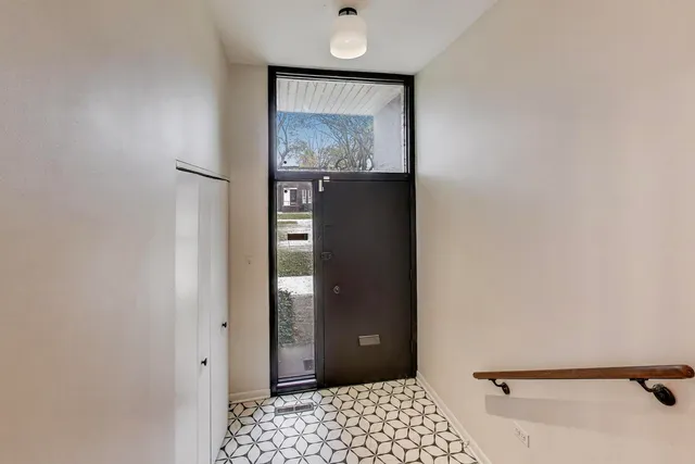 a view of a hallway with a closet