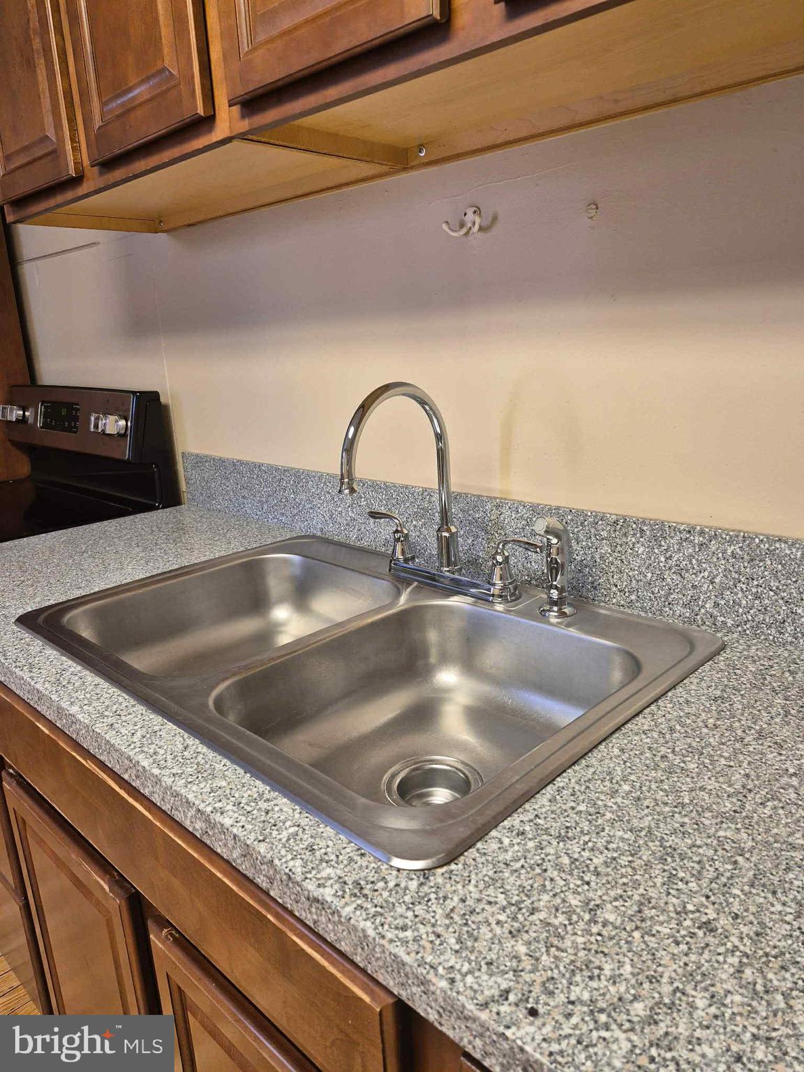 25 South Market Street, Unit 2 Frederick, MD 21701 - Photo 7 of 14 a close view of sink and tap