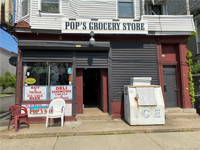 a front view of a building with glass windows