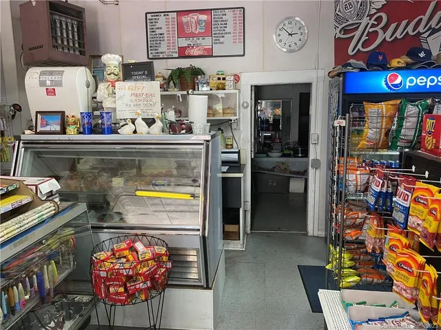 a picture of a room with shelves