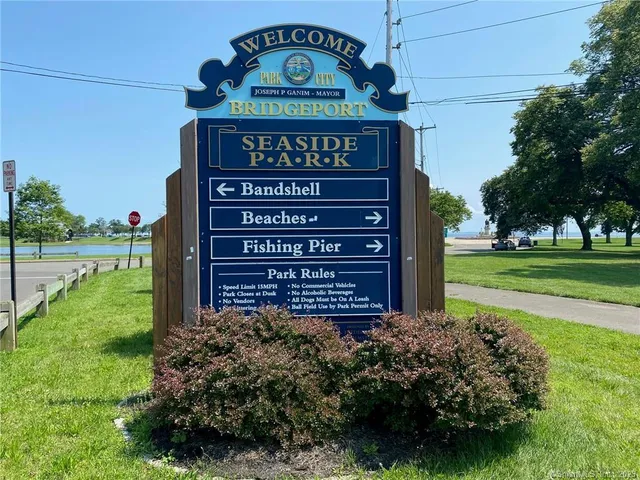 a view of a park that has a sign on the side of it