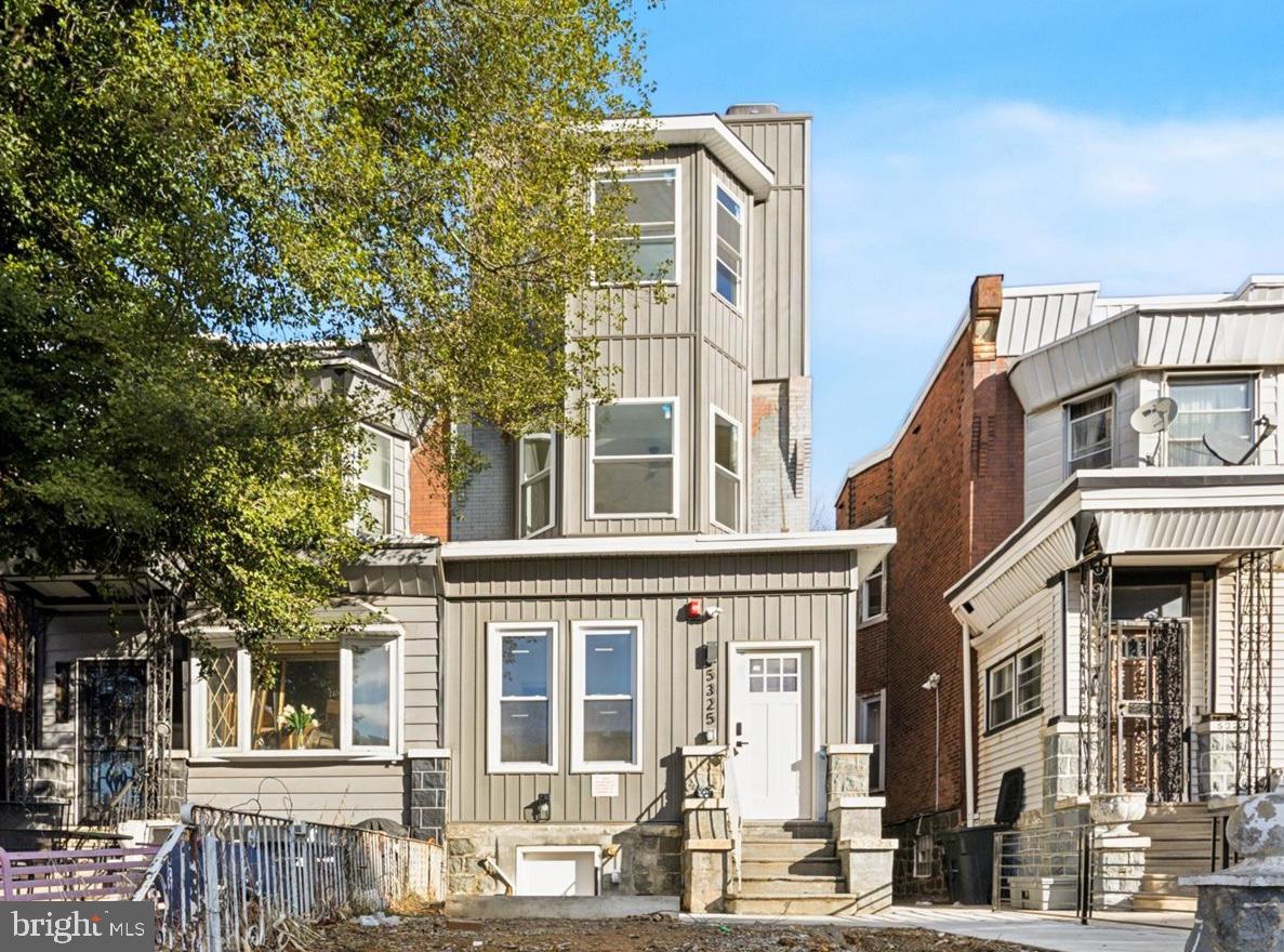 5325 Baltimore Avenue, Unit 2 Philadelphia, PA 19143 - Photo 25 of 25 a front view of a building with a tree