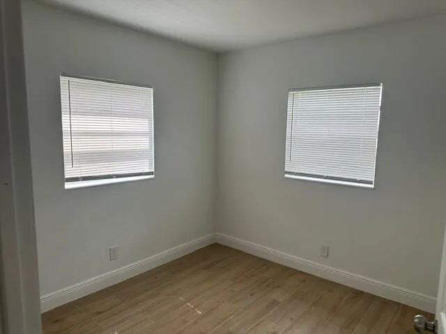 an empty room with a window