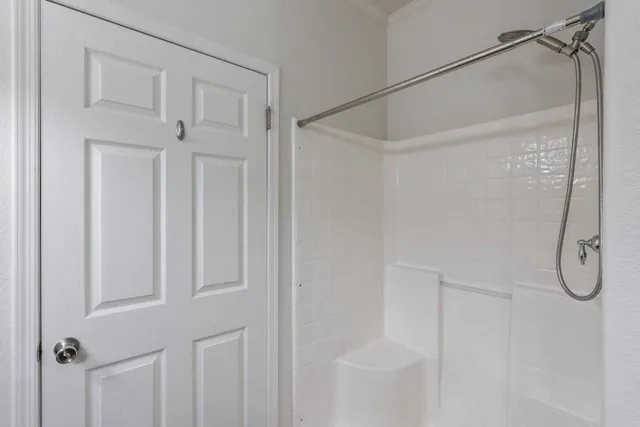 a view of an empty walk in closet