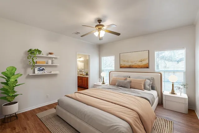 a large kitchen with granite countertop lots of counter space a sink and appliances