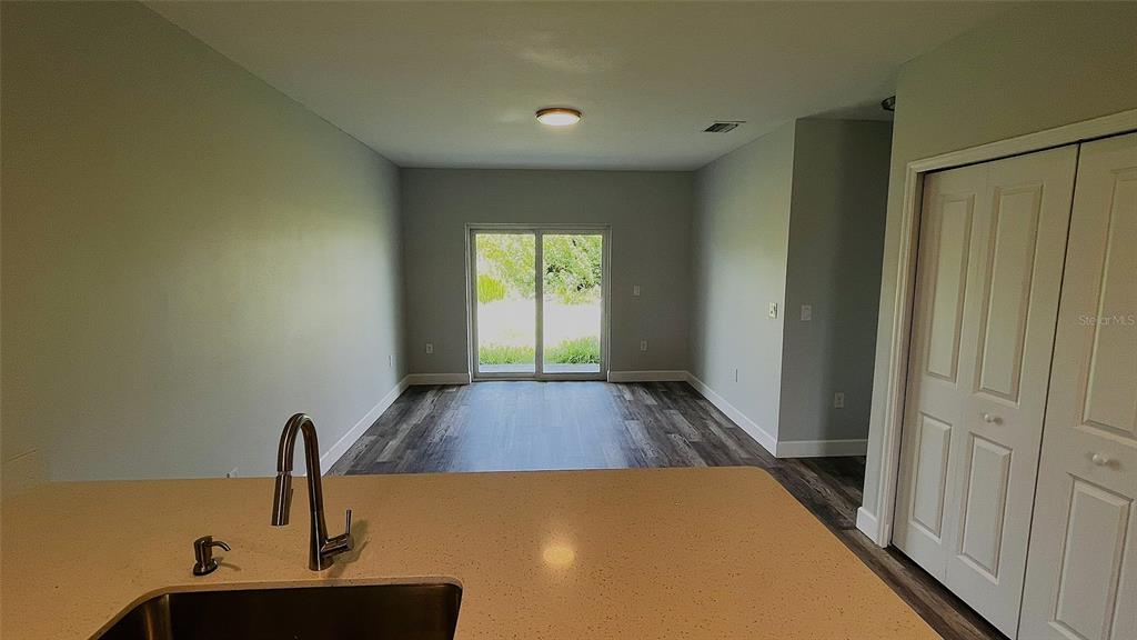 12258 Henley Avenue, Unit B Port Charlotte, FL 33981 - Photo 13 of 39 a view of a sink in a hall with a window