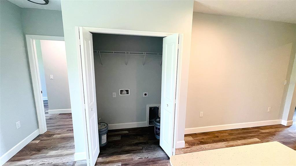 12258 Henley Avenue, Unit B Port Charlotte, FL 33981 - Photo 21 of 39 a view of a bathroom with wooden floor
