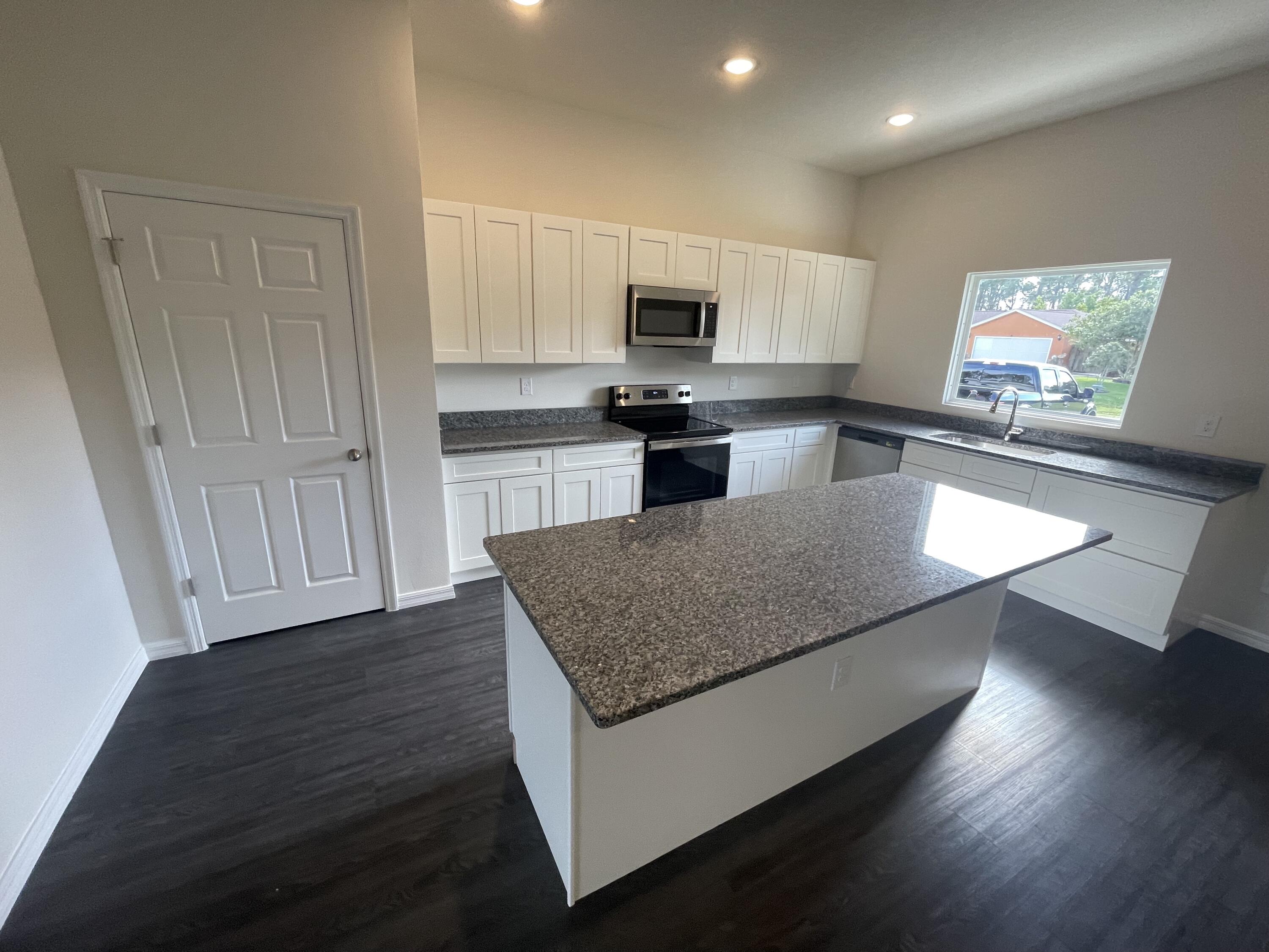 1203 Sexton Road Southwest Palm Bay, FL 32908 - Photo 2 of 10 Sexton Kitchen 2
