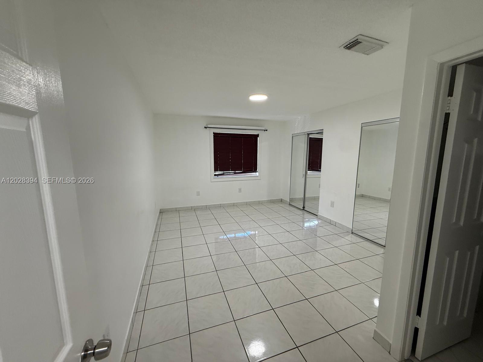 2212 West 74th Street, Unit 20128 Hialeah, FL 33016 - Photo 6 of 11 a view of empty room