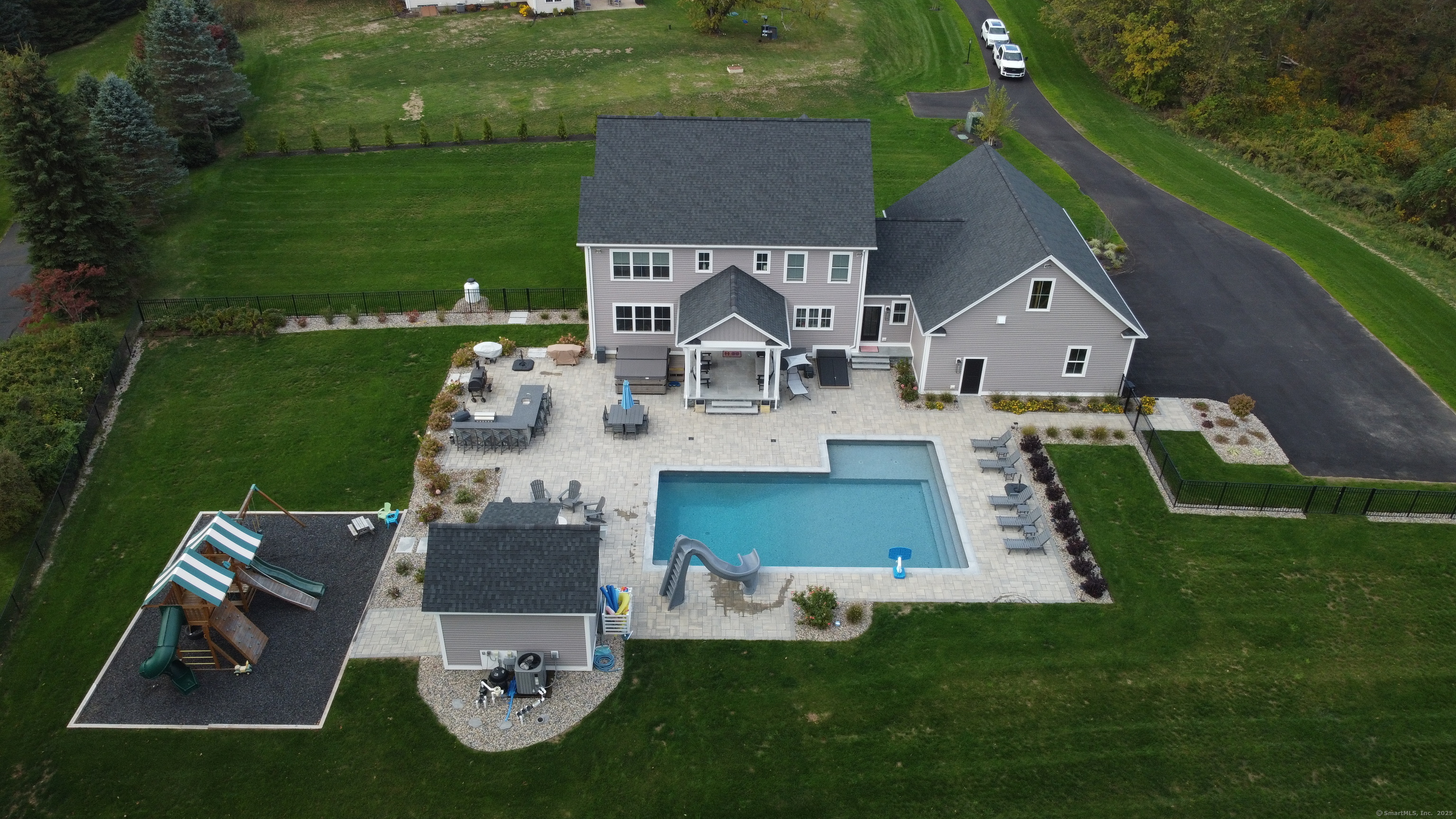 Every lot on Cameron Court has room for a pool. This property's pool has a large surround for relaxing or entertaining, a play area for kids and inspires ideas for what you might want in your yard!