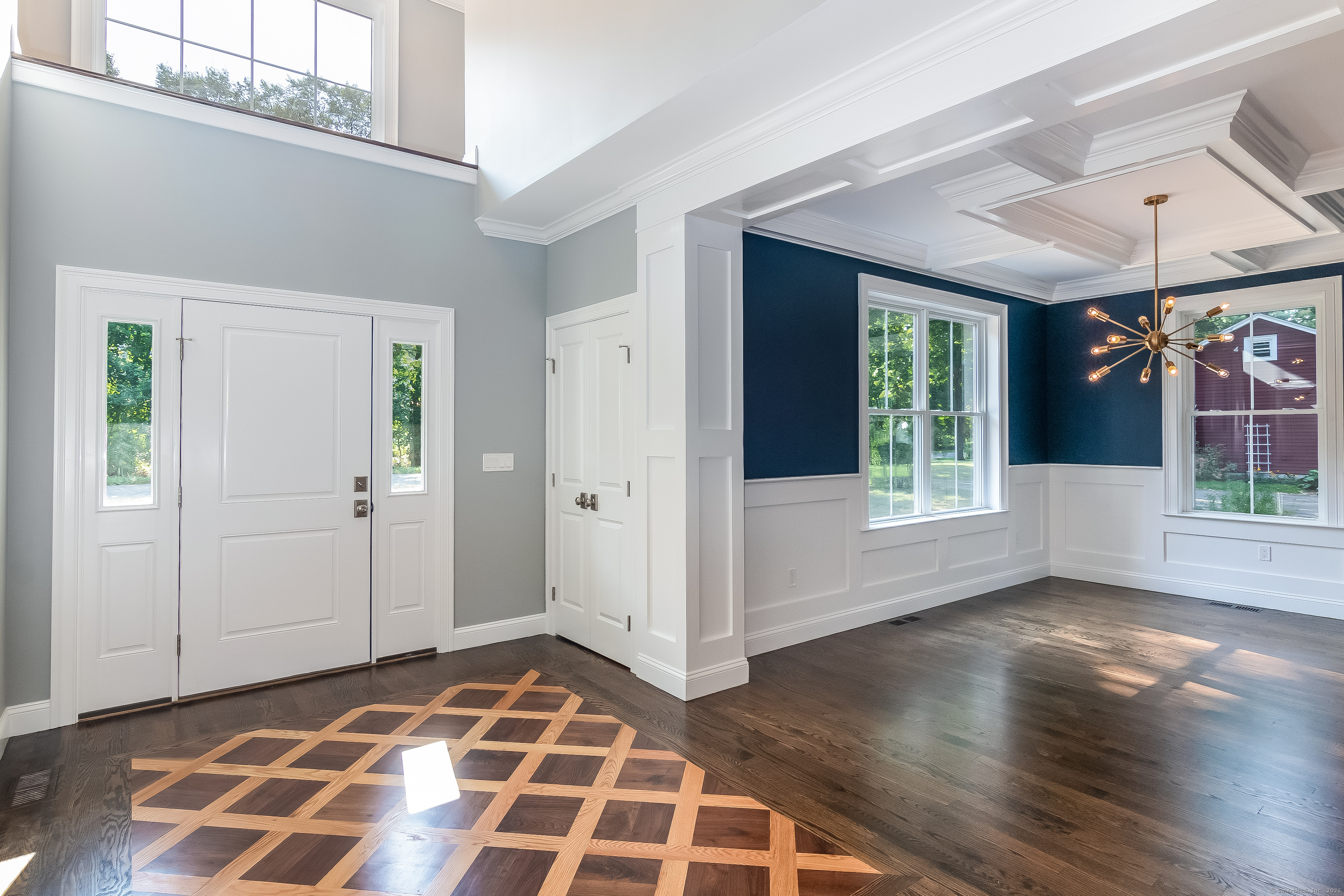 11 Buttonball Road Old Lyme, CT 06371 - Photo 19 of 40 Photo of a different build which featured custom inlaid wood foyer and coffered dining room ceiling.