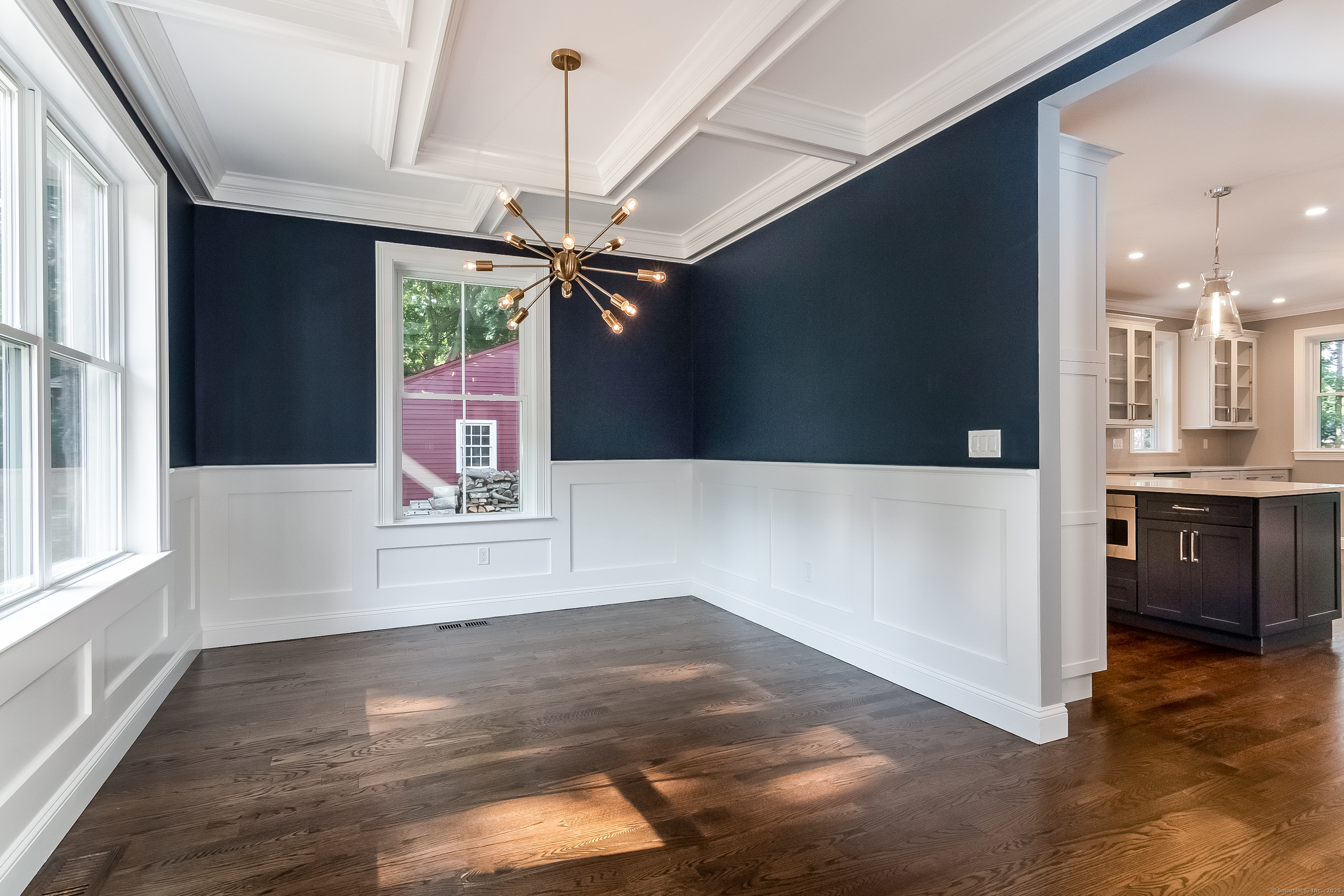 11 Buttonball Road Old Lyme, CT 06371 - Photo 20 of 38 a view of a living room with hardwood floor and a ceiling fan