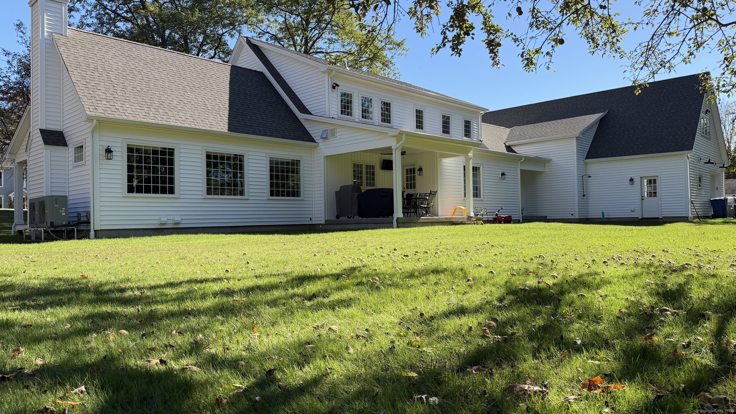 11 Buttonball Road Old Lyme, CT 06371 - Photo 24 of 38 This cape design looks modest from the street but has expands toward the back yard.