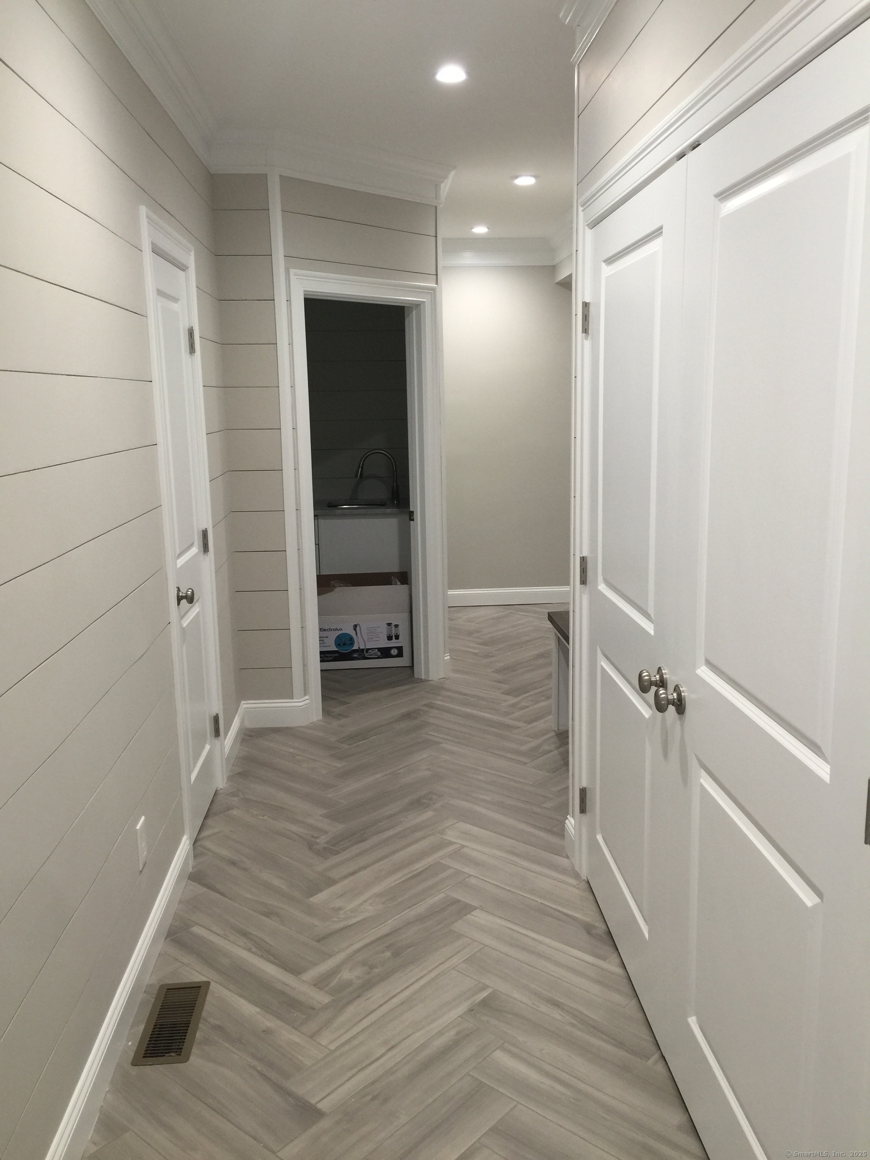 11 Buttonball Road Old Lyme, CT 06371 - Photo 27 of 38 Stunning entry from garage in a shoreline home.