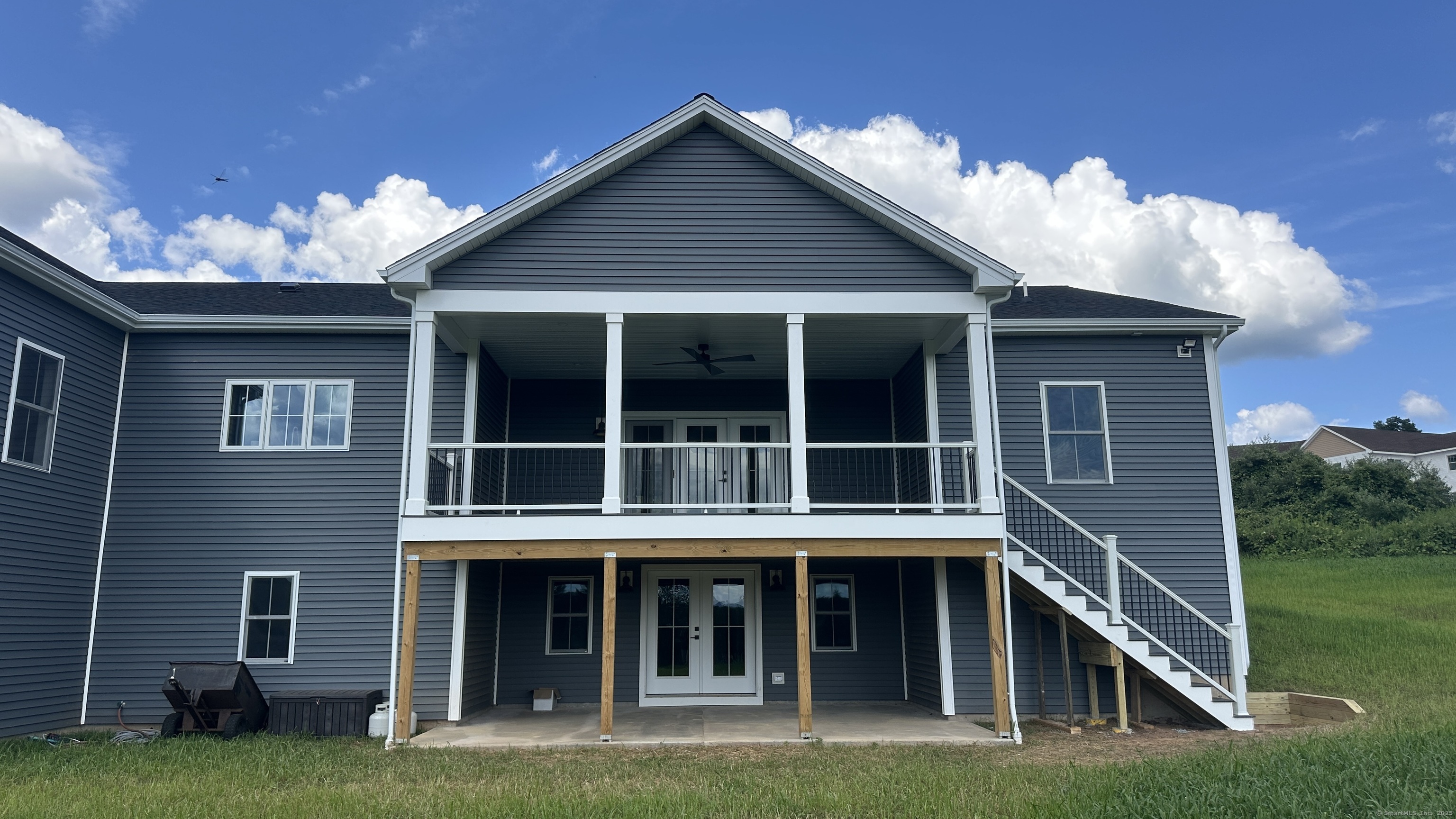 11 Buttonball Road Old Lyme, CT 06371 - Photo 3 of 38 The covered porch feature allows time outdoors no matter what the weather is doing!