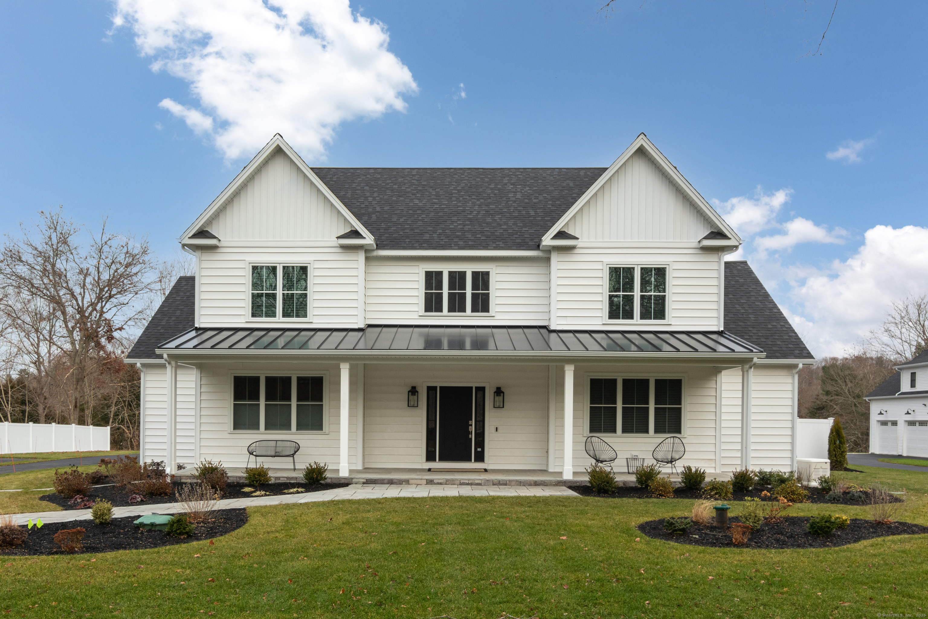 11 Buttonball Road Old Lyme, CT 06371 - Photo 34 of 38 a front view of a house with a yard