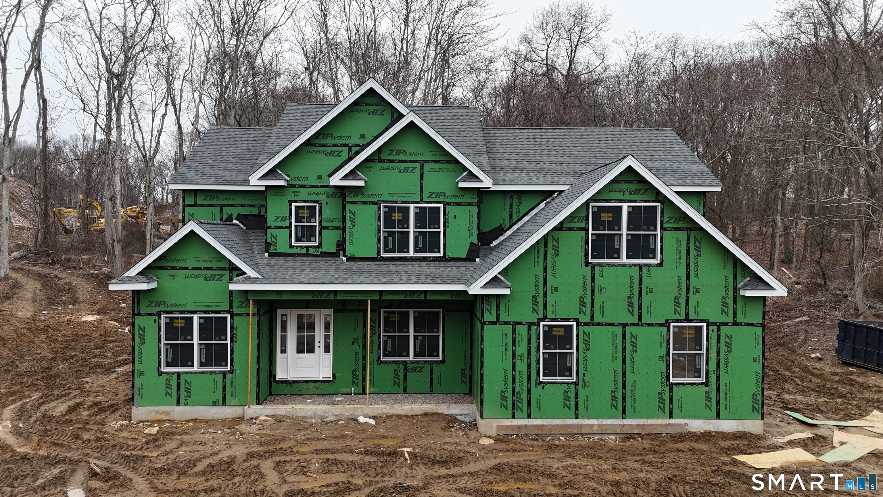 11 Buttonball Road Old Lyme, CT 06371 - Photo 4 of 40 Looking at the Ashton after roof, doors and windows have been installed.