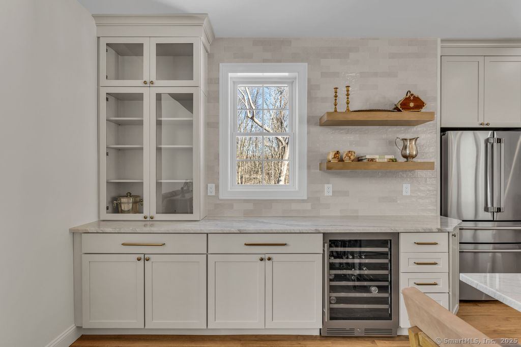 11 Buttonball Road Old Lyme, CT 06371 - Photo 7 of 38 Kitchen with drink bar designed for a Madison client.