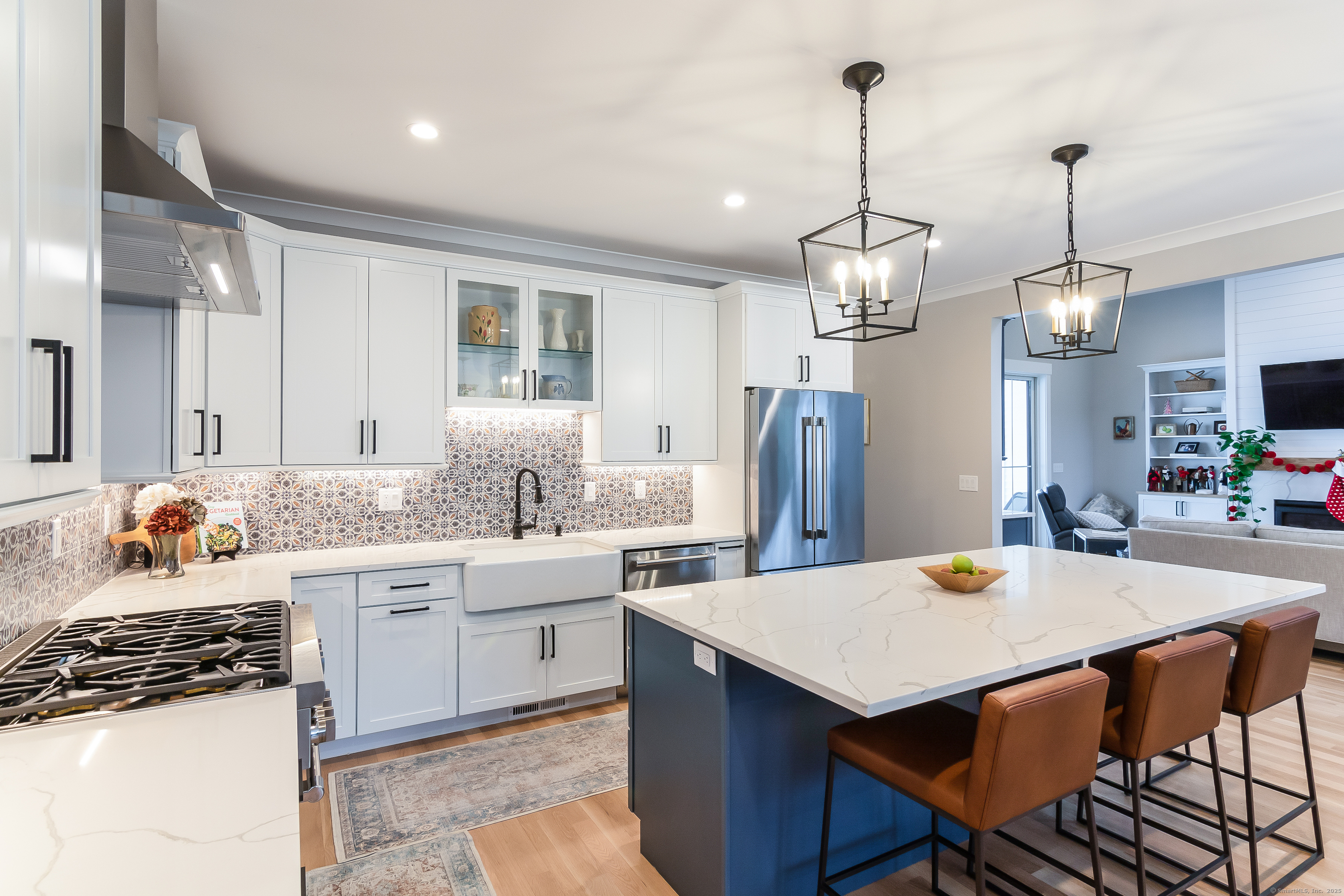 11 Buttonball Road Old Lyme, CT 06371 - Photo 10 of 38 Example of a kitchen in a farmhouse with contrasting island and perimeter cabinets.
