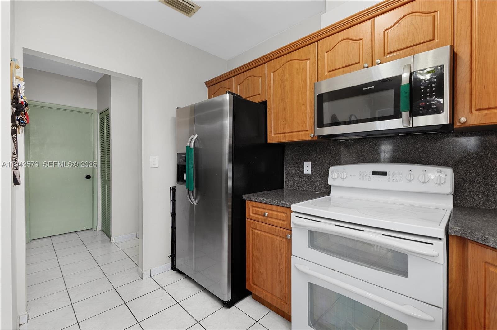 2818 Southwest 2nd Street Miami, FL 33135 - Photo 14 of 47 a utility room with washer and dryer