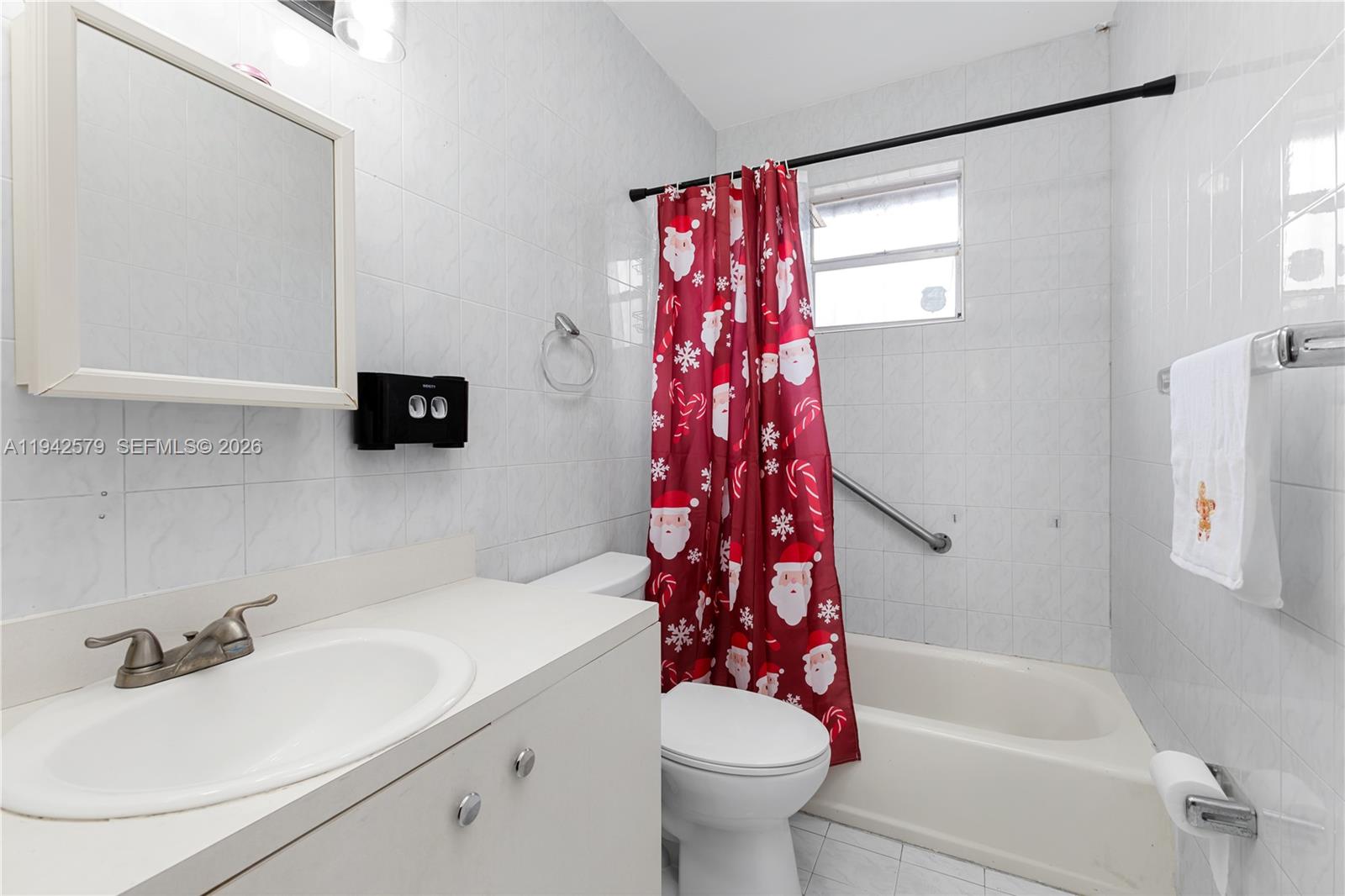 2818 Southwest 2nd Street Miami, FL 33135 - Photo 20 of 47 a bathroom with a sink toilet and shower