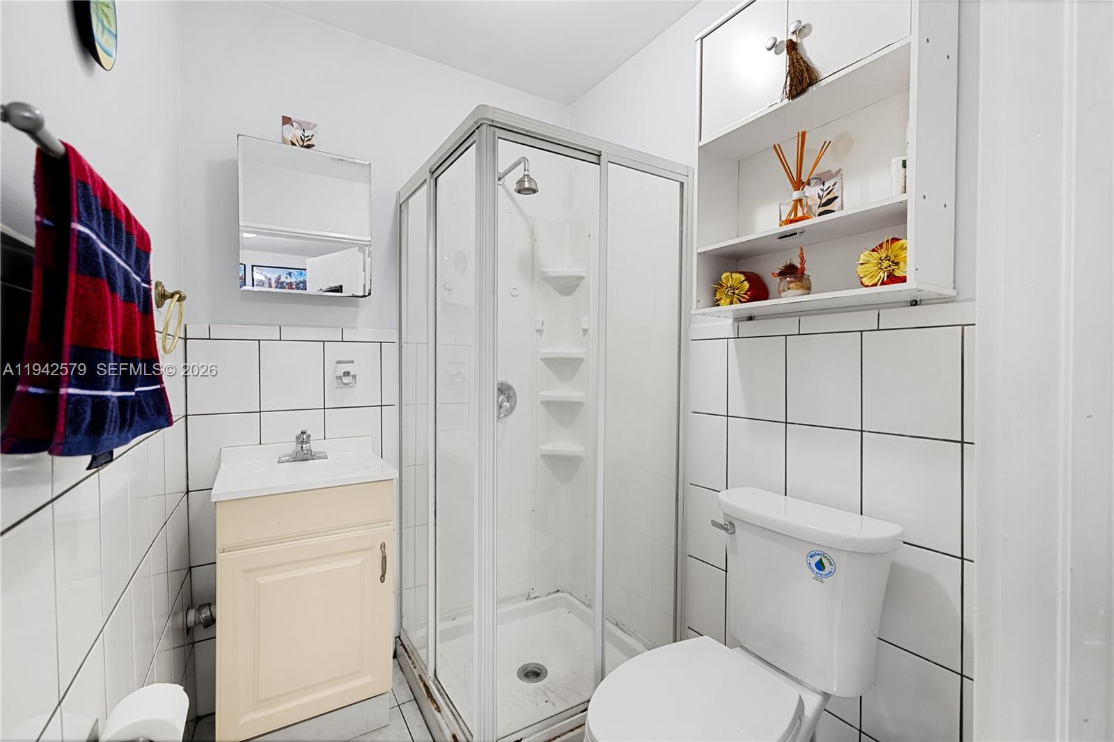 2818 Southwest 2nd Street Miami, FL 33135 - Photo 34 of 47 a bathroom with a sink a toilet and shower