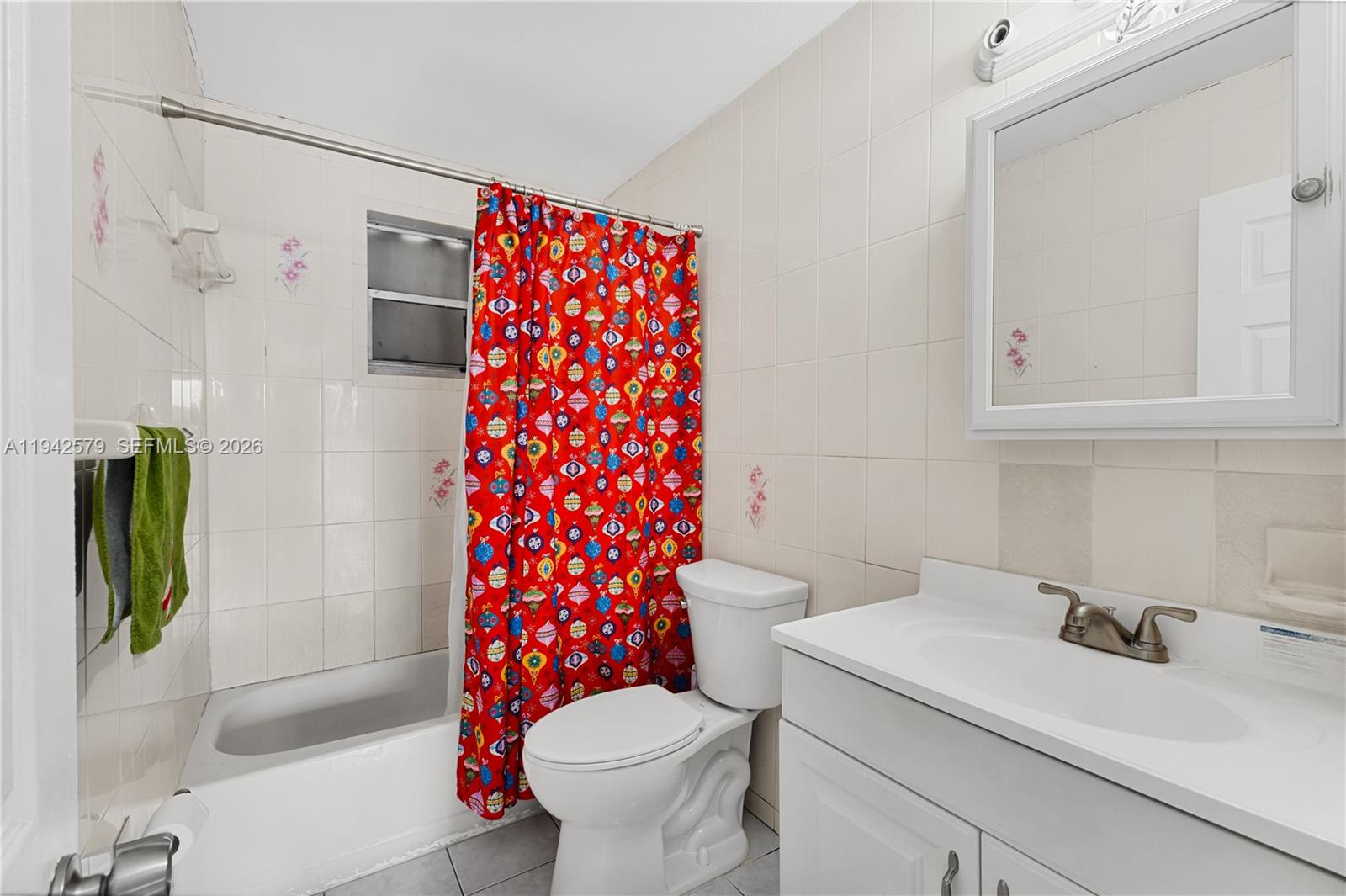 2818 Southwest 2nd Street Miami, FL 33135 - Photo 35 of 47 a bathroom with a sink toilet and shower