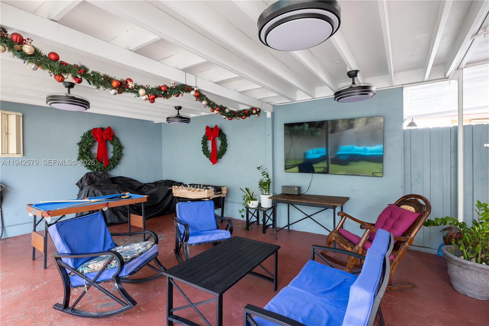 2818 Southwest 2nd Street Miami, FL 33135 - Photo 38 of 47 a group of people sitting in a room