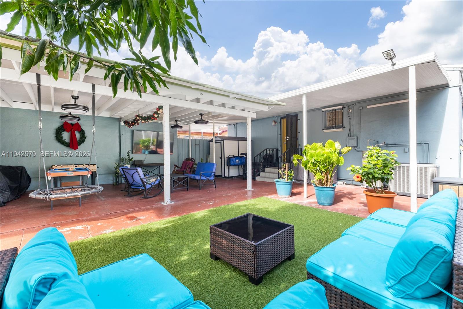 2818 Southwest 2nd Street Miami, FL 33135 - Photo 40 of 47 a view of a backyard with furniture and a garden