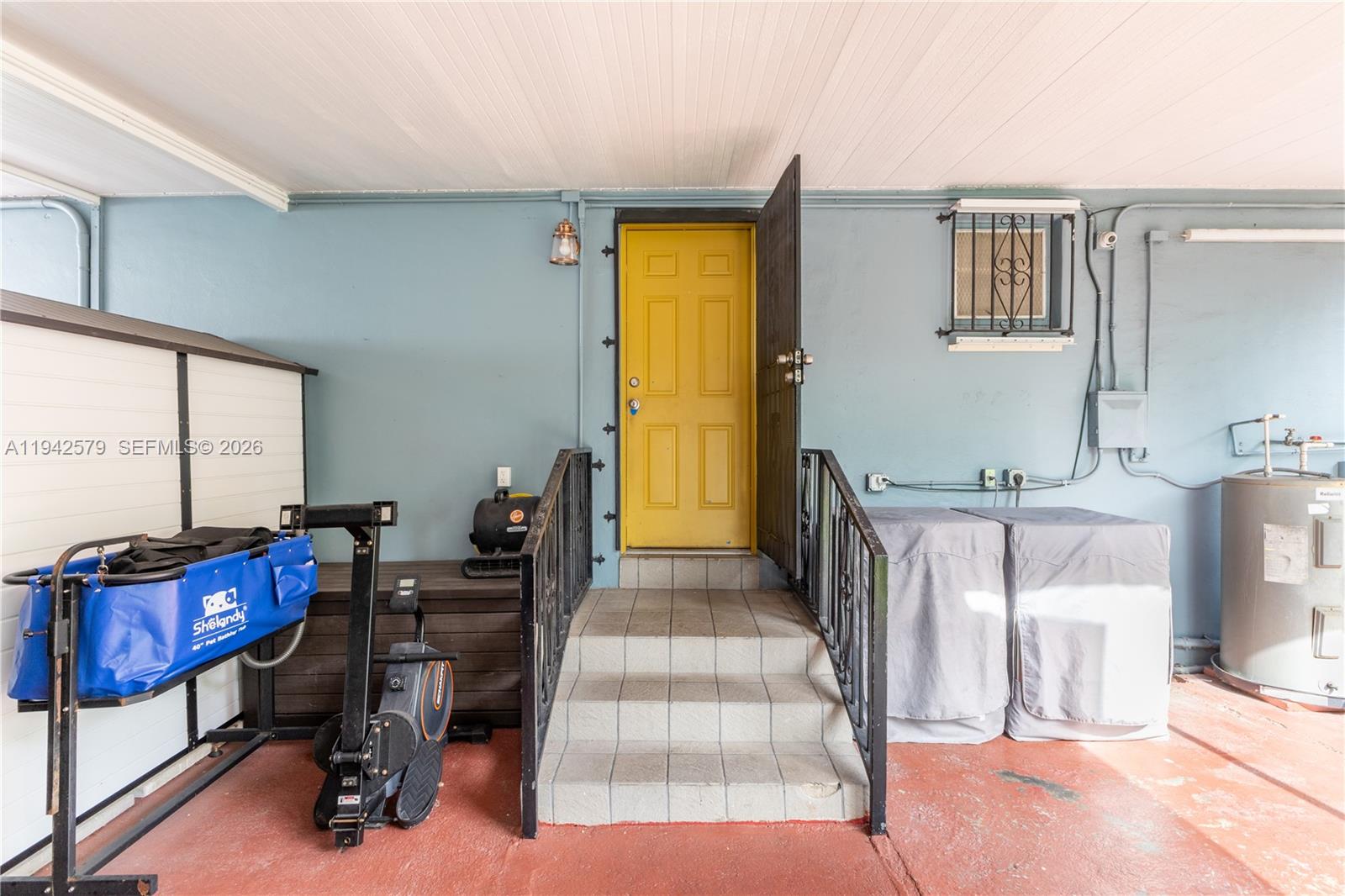 2818 Southwest 2nd Street Miami, FL 33135 - Photo 47 of 47 a bedroom with furniture and a large window