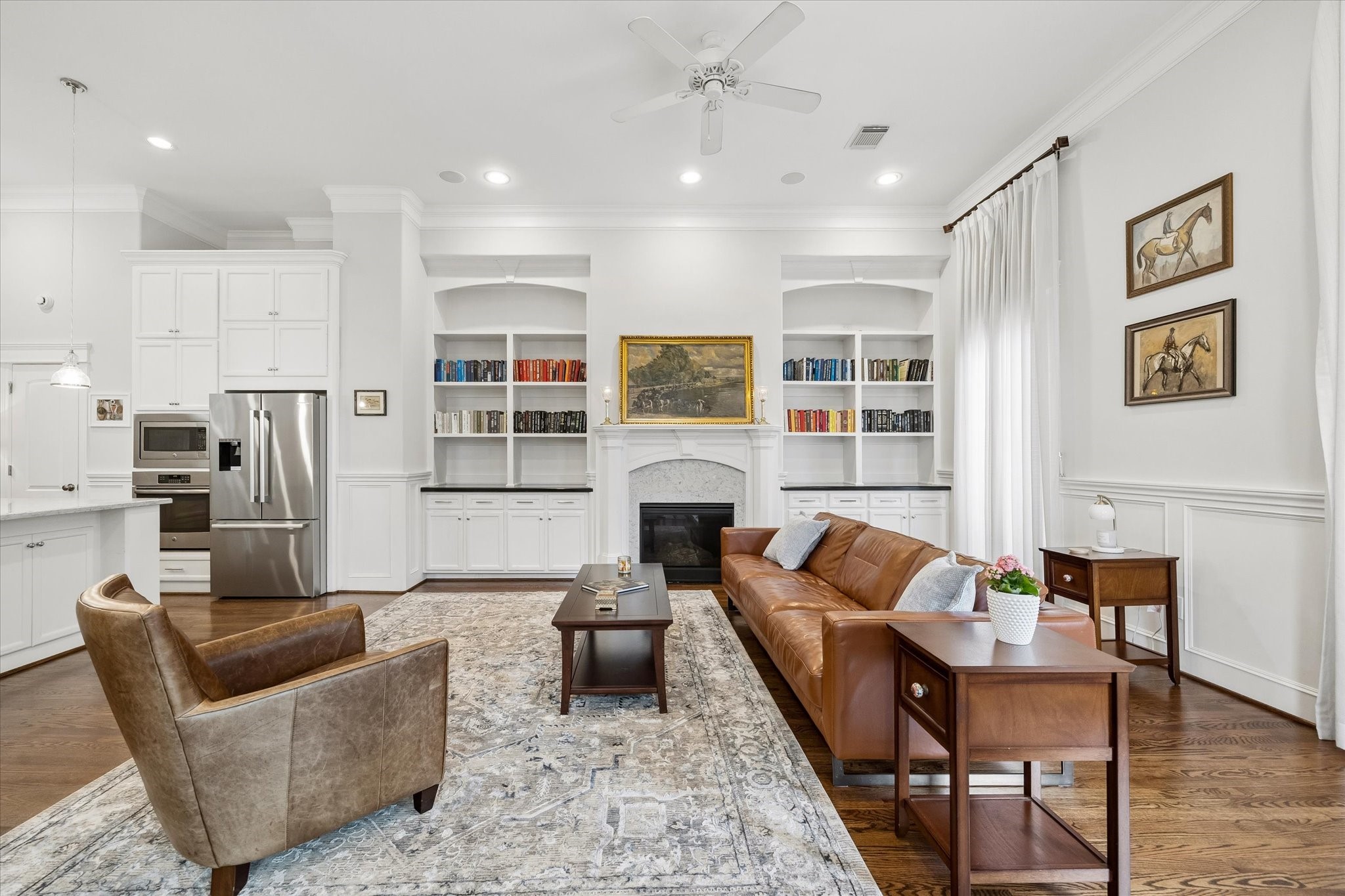 609 Rutland Street, Unit A Houston, TX 77007 - Photo 7 of 30 a living room with furniture kitchen and a fireplace