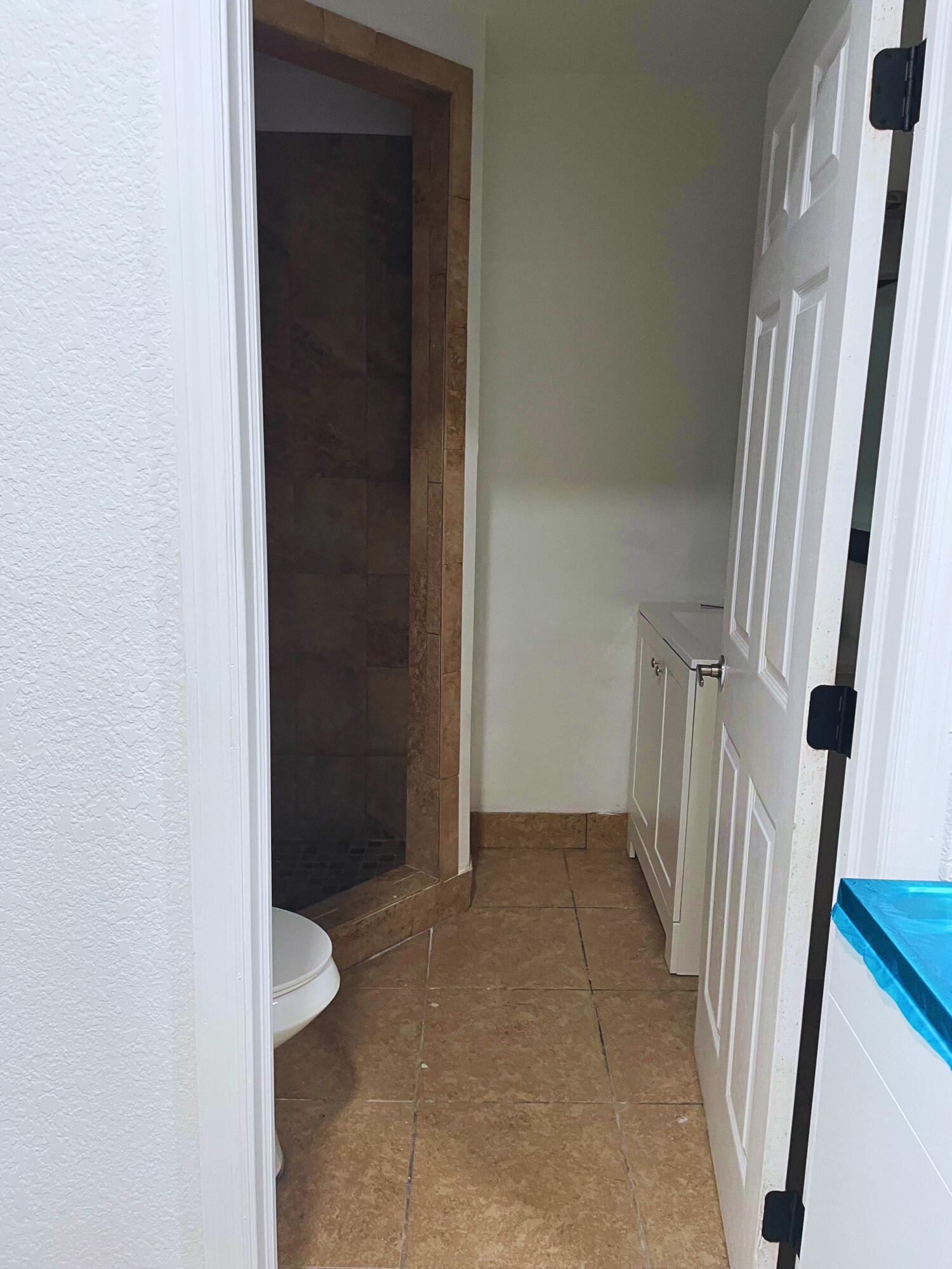 1340 West 33rd Street Riviera Beach, FL 33404 - Photo 15 of 18 a view of an empty room with a window