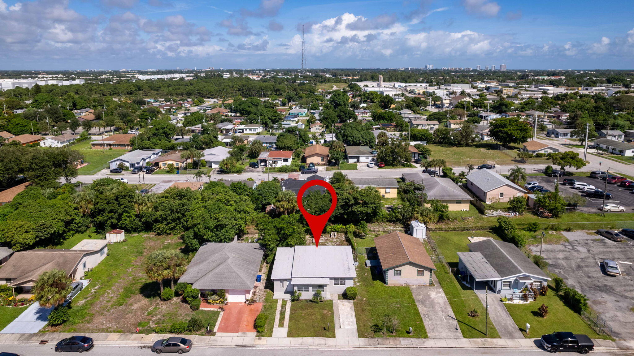 1340 West 33rd Street Riviera Beach, FL 33404 - Photo 18 of 18 an aerial view of residential houses with outdoor space and street view
