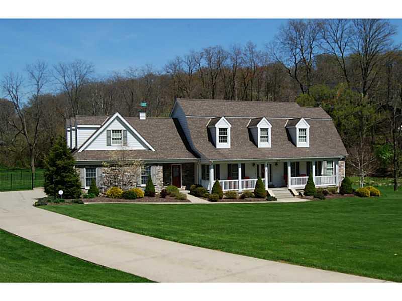 Exterior Front. Fantastic curb appeal, level 4 acre lot