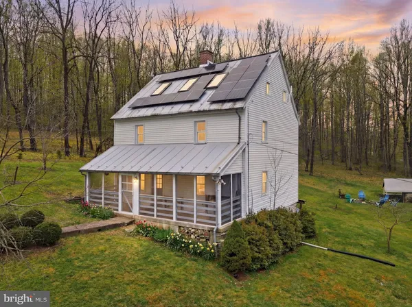 a aerial view of a house with garden