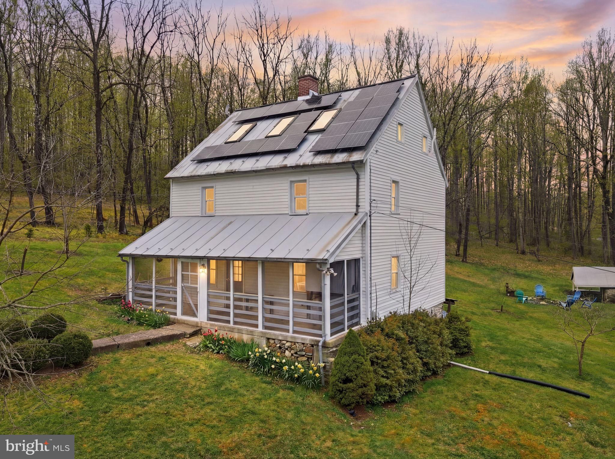 7456 Eylers Valley Flint Road Thurmont, MD 21788 - Photo 2 of 51 a aerial view of a house with garden