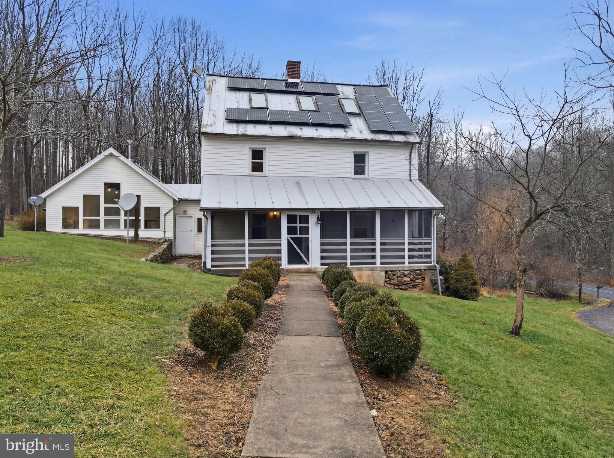 7456 Eylers Valley Flint Road Thurmont, MD 21788 - Photo 43 of 51 a front view of a house with a yard