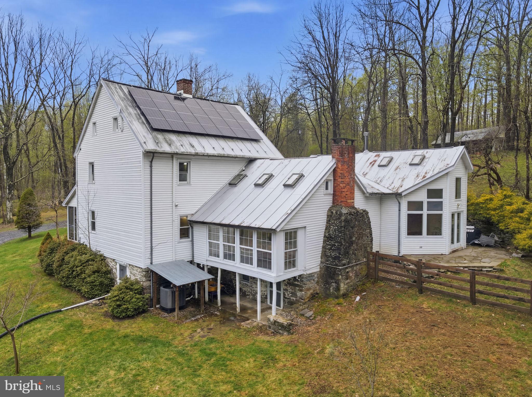 7456 Eylers Valley Flint Road Thurmont, MD 21788 - Photo 47 of 51 a view of a house with a yard and sitting area