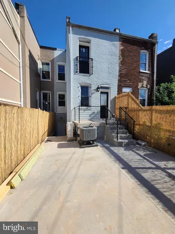 a building outdoor space with patio furniture