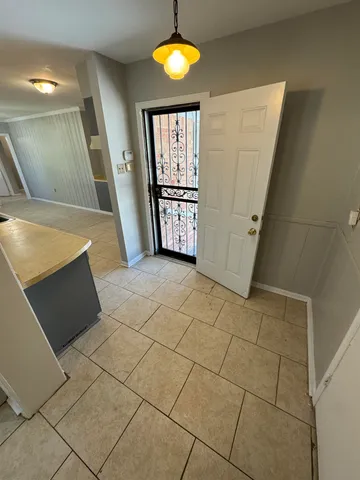 a view of a hallway with entryway